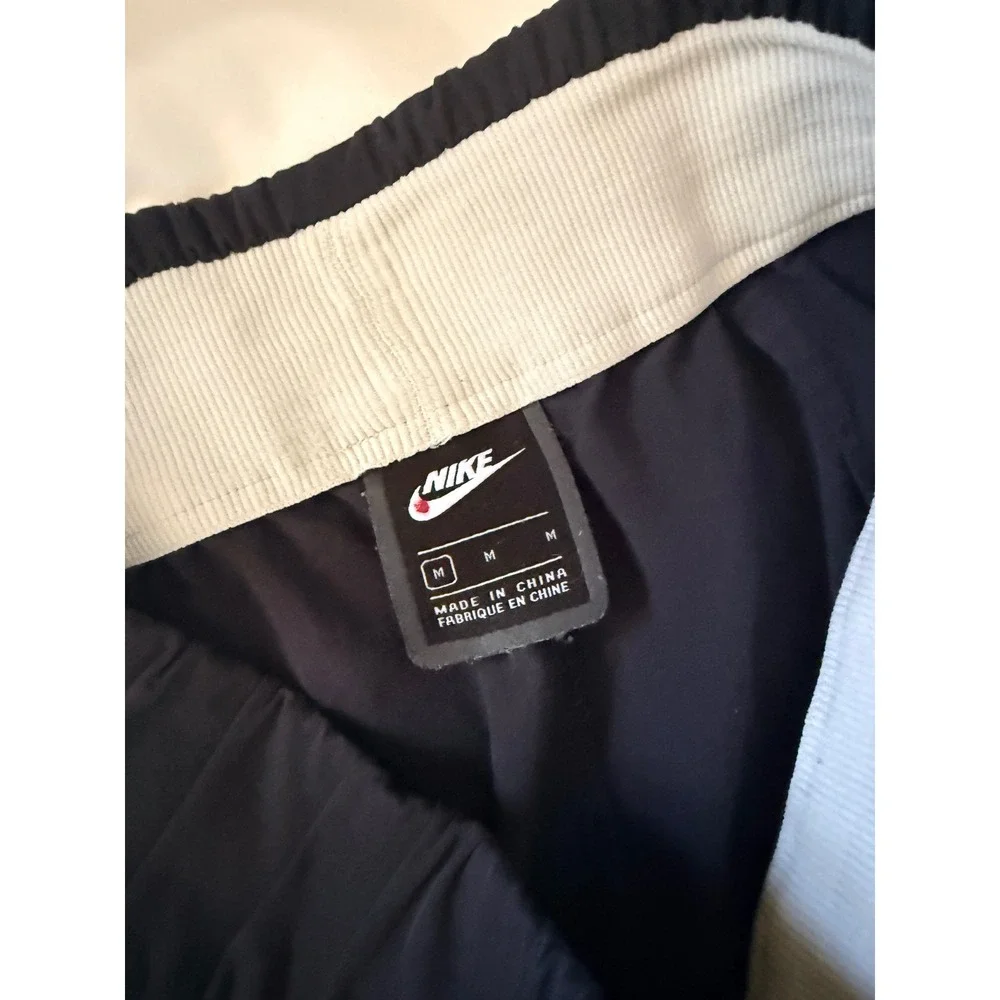 Nike Sportswear Tech Pack Stirrup Pants Black Tapered Knee Vent Women's Medium